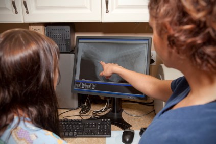 Two doctors looking at an x-ray